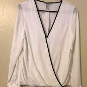 White blouse with black trim